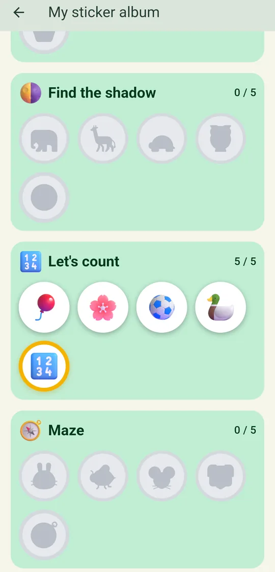 Sticker album: collected stickers in color, uncollected ones as gray shadows