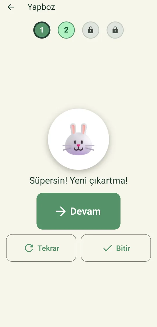 Seviye bitti: yeni çıkartma kazanıldı, konfeti ve Devam düğmesi